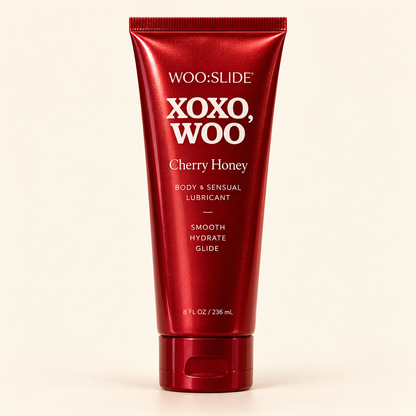 WOO:SLIDE Cherry Honey lubricant tube on a clean cream background